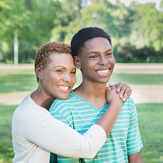 Mother and Teen Son Enjoying Park.