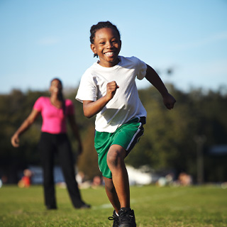 Young boy running.